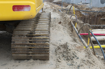 excavator on road construction site