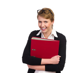 Smiling student with ring binder.