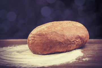 Delicious bread on a wood table