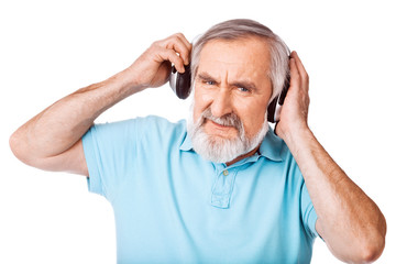 Old guy holding the headphones