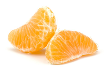 Peeled tangerine segments isolated on white background