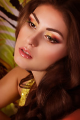 Portrait of beautiful young woman with makeup