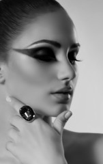 woman with makeup with jewelry precious decorations.