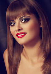 Fototapeta premium Portrait of beautiful young woman with makeup