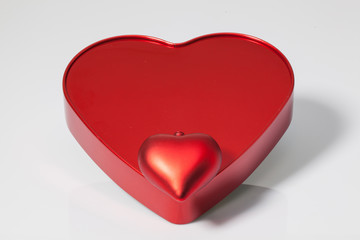 Two red hearts on the table