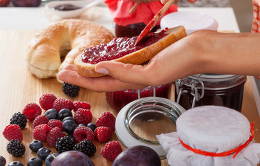 Berries and bread with jam - obrazy, fototapety, plakaty