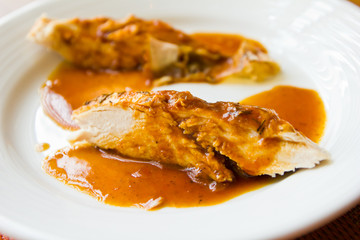 chicken with sauce on plate