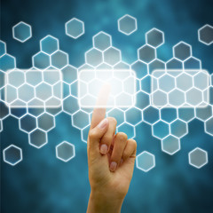 Woman hand touching tactile screen