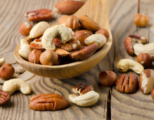 Mix nuts on a wooden table