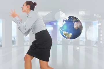 Fototapeta premium Composite image of furious businesswoman gesturing