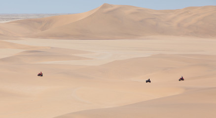 Fototapeta na wymiar Quad tour in the desert in the Namib desert