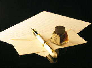 fountain pen and letter