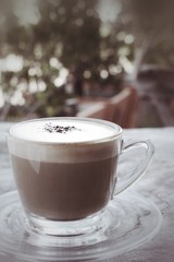 Cup with hot cappuccino