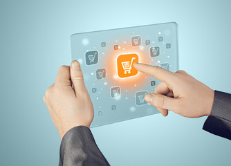 Businessman pushing shopping cart