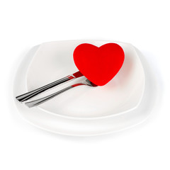 Red Heart shape on a white plate with clipping path