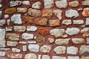 Texture mur en pierre sèche joints ocre
