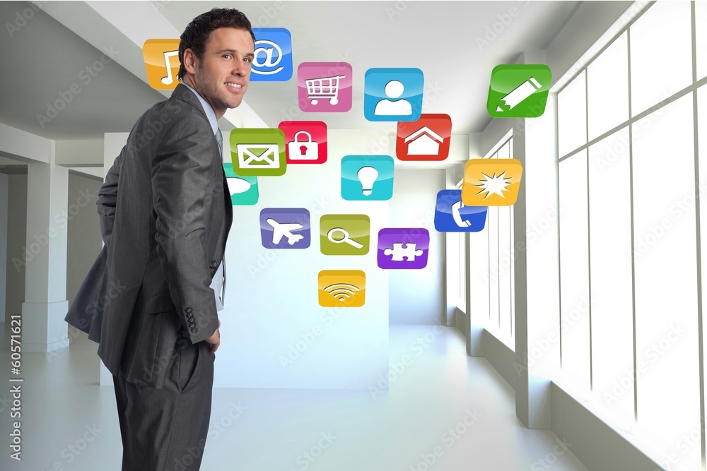 Poster composite image of smiling businessman with hands on hips