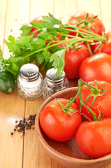 tomatoes in wooden bowlin