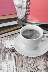 Cup of coffee on a wooden table