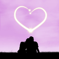 Loving couple under the heart in the sky