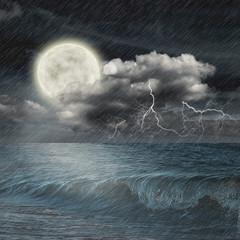 storm evening on ocean and the moon