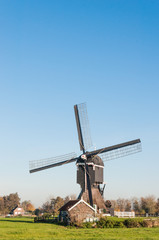 Fototapeta na wymiar Historic watermill in the Netherlands