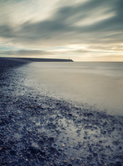 Vintage style cross processed seascape long exposure