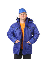 Man in winter workwear and hard hat.