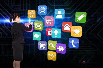 Composite image of businesswoman pointing