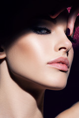 Close-up beauty portrait of beautiful model with bright make-up