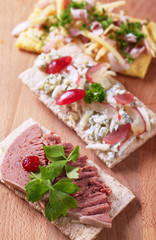 Crispbread with various savory toppings