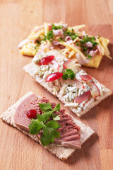 Crispbread with various savory toppings