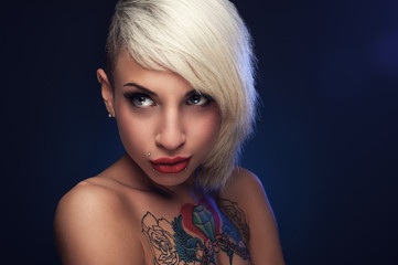 Beautiful blond with a tattoo on his chest