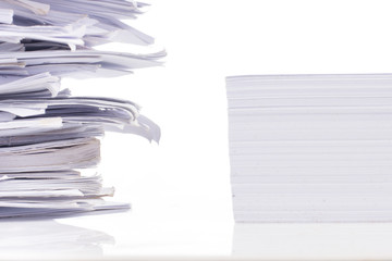 Piled up office work papers