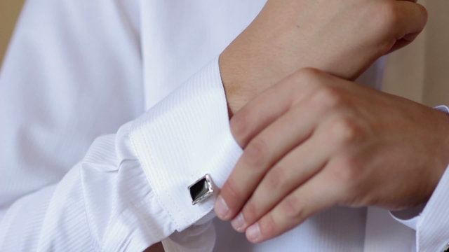 men wear a shirt and cufflinks