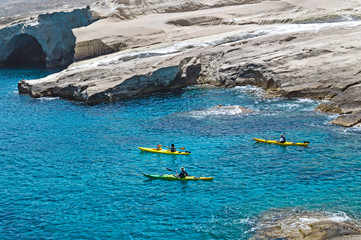Colorful kayaks on the tropical beach on Milos island, Greece - 60586055