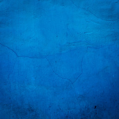 Blue cracked wall background close up texture - obrazy, fototapety, plakaty