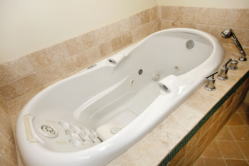 Modern white whirlpool bath tube
