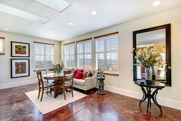 Great matching rustic furniture in a modern light dining area