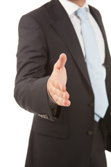 Detail of a business man with an open hand ready to seal a deal