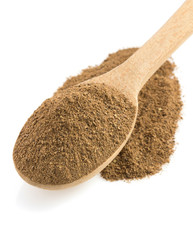 allspice powder and wooden spoon