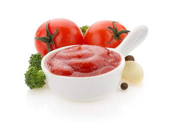 tomato sauce in bowl on white