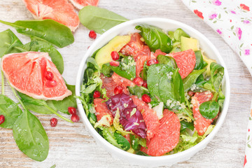 Salad. Salad with grapefruit, avocado and pomegranate seeds
