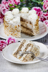 Layer vanilla and chocolate cake. Bouquet of pink carnations