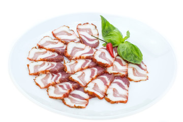 bacon, onion and pepper on a plate in a restaurant