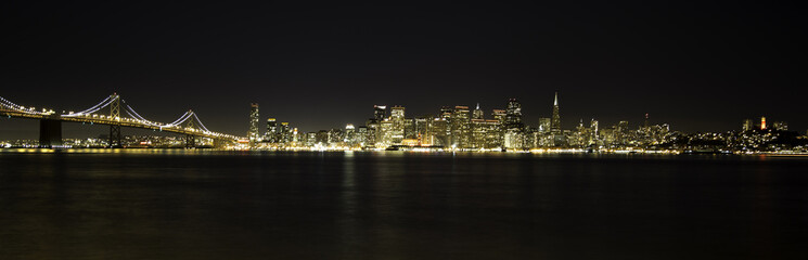 Fototapeta na wymiar San Francisco Night Skyline and BayBridge