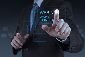 businessman hand show webinar online conference