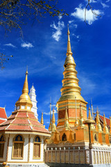 Fototapeta premium Beautiful golden pagoda under deep blue sky