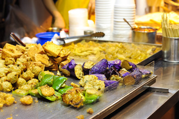 Fototapeta premium Fried vegetables at Hong Kong street food stall