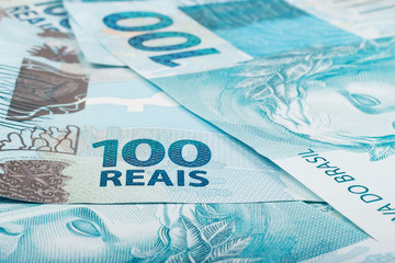 A hundred reais bills (brazilian money)